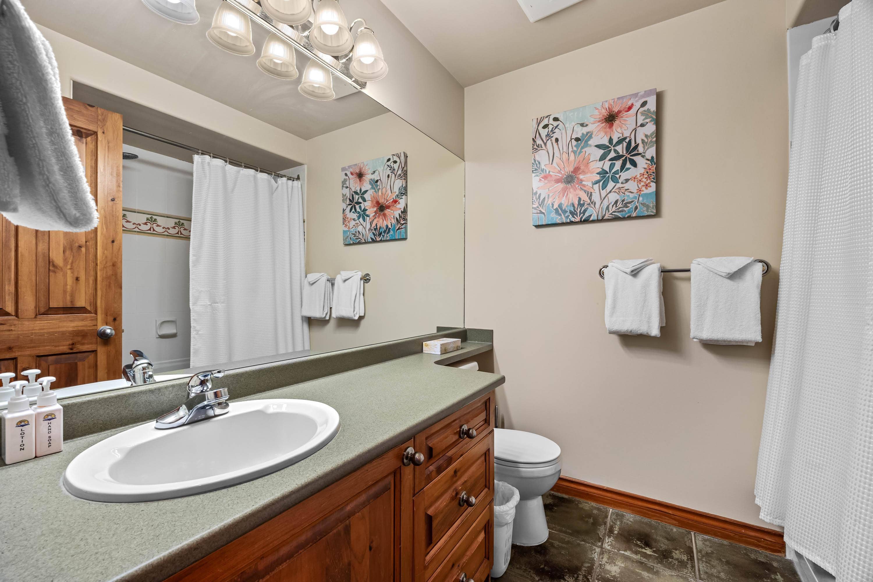 Sun Peaks Resort summer — golf, biking, and lake activities near Timberline 24