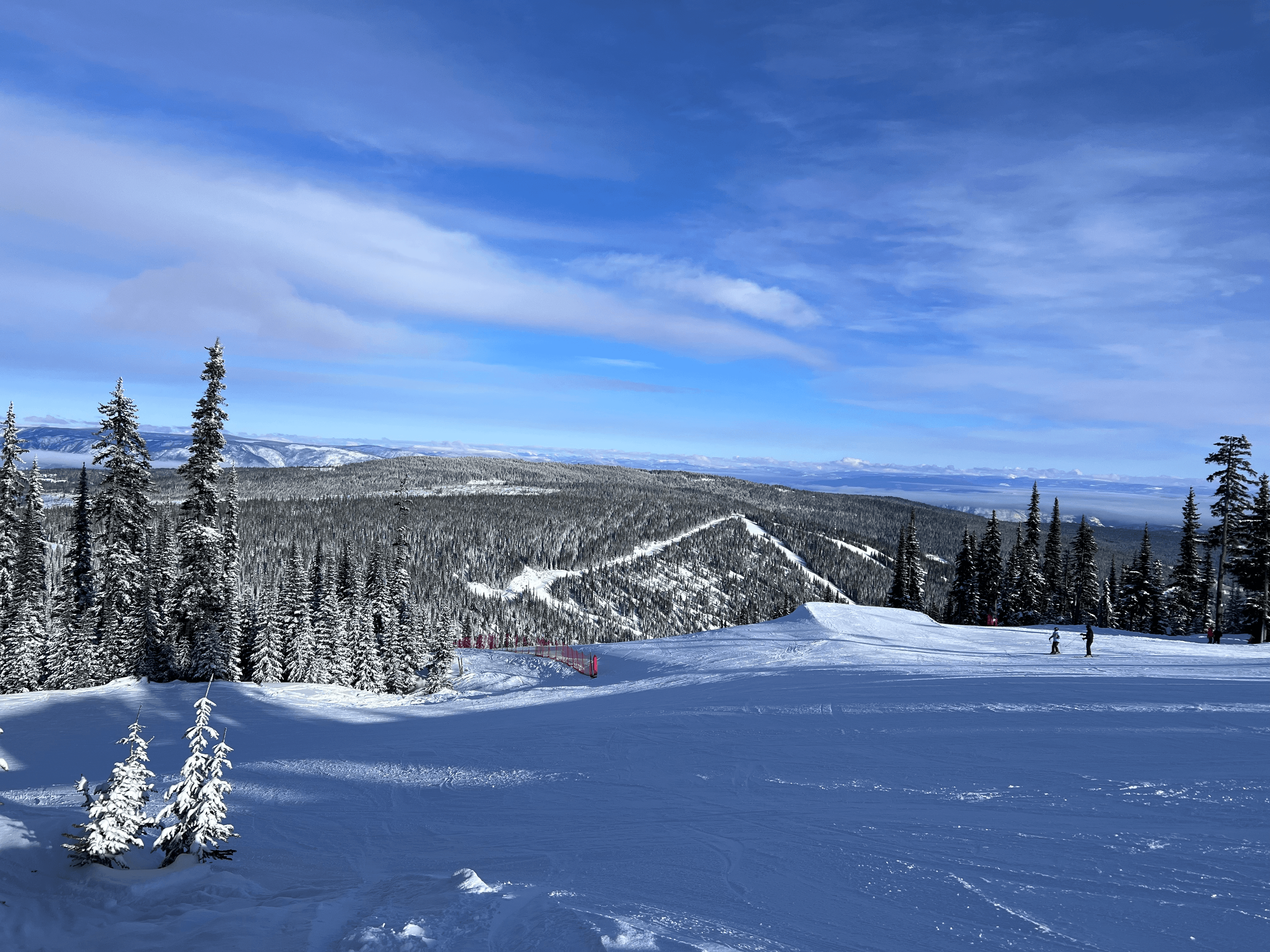 Snow-covered runs and lifts at Sun Peaks Resort, BC, Canada in winter