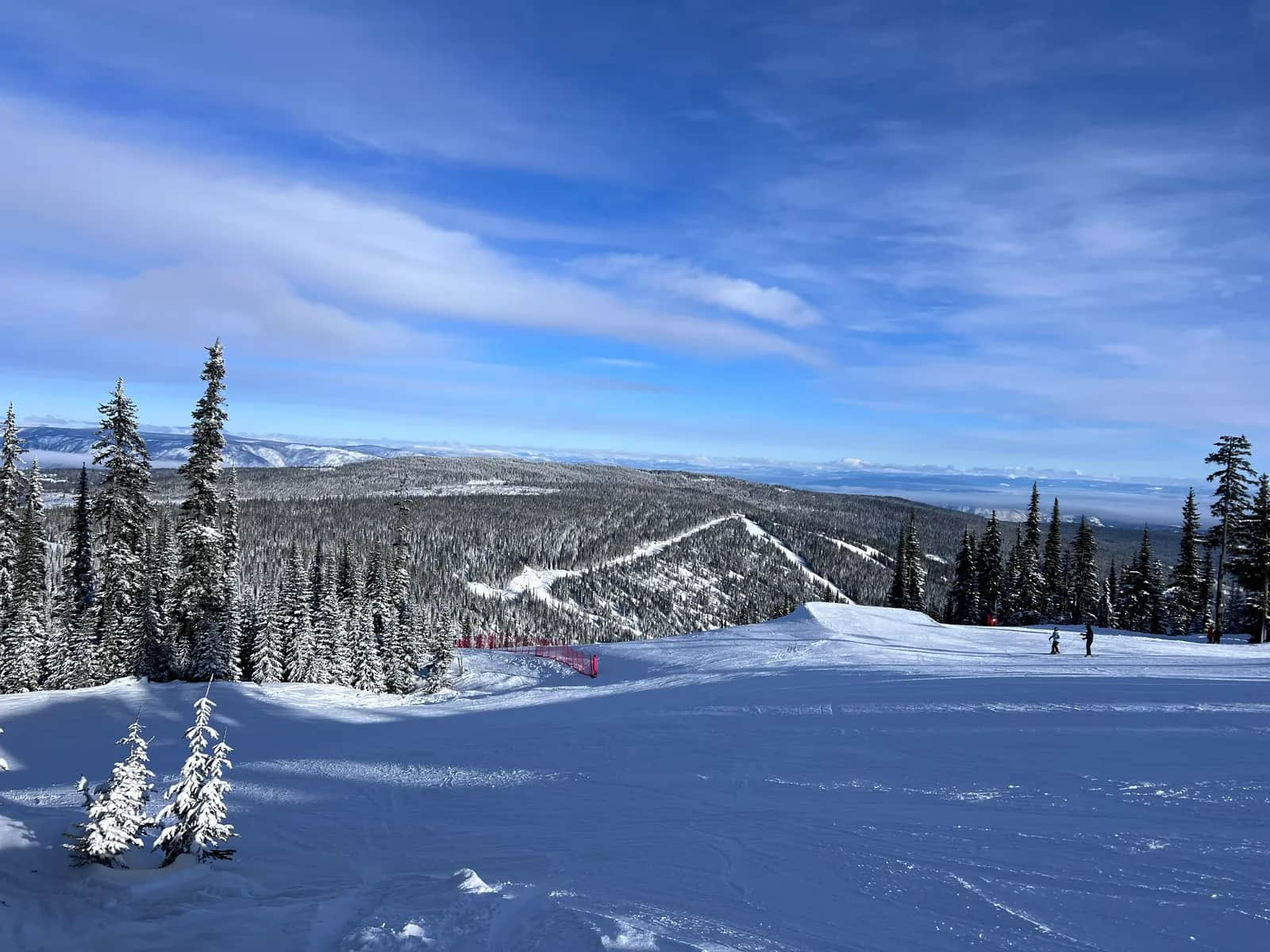 Snow-covered runs and lifts at Sun Peaks Resort, British Columbia, Canada in winter